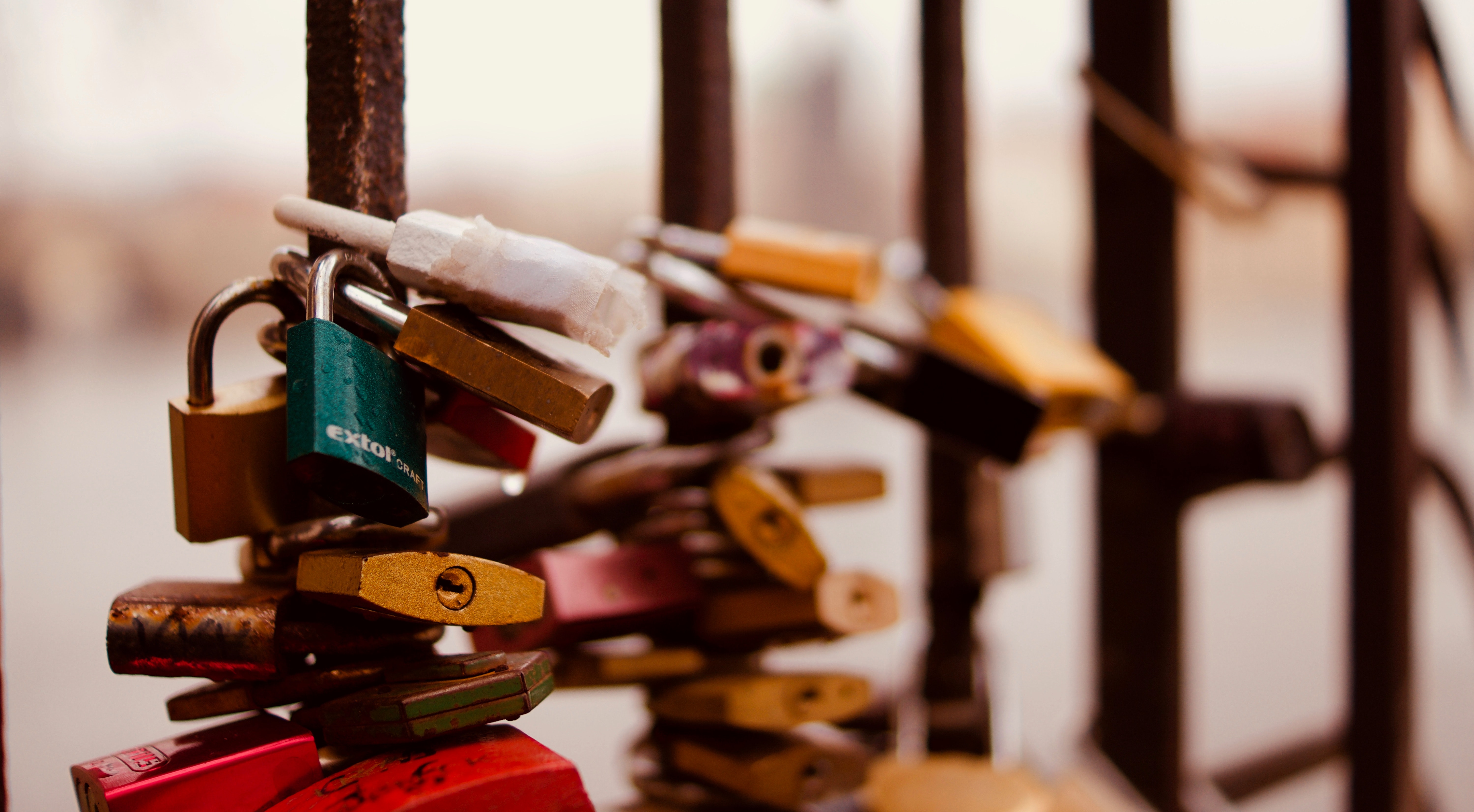 selective-focus-photography-of-padlocks-on-fence-709730